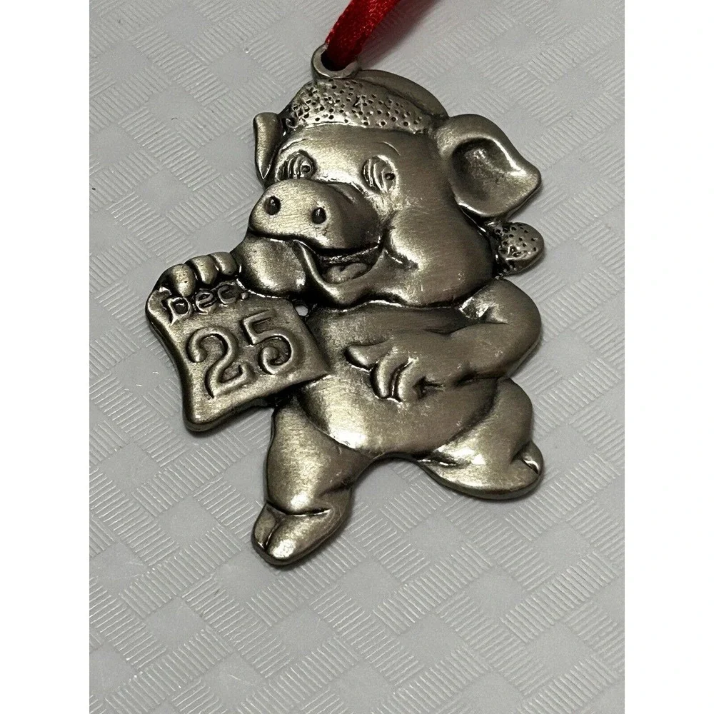 Christmas Pig With‎ Hat Holding a Dec. 25 Calendar Page Metal Ornament